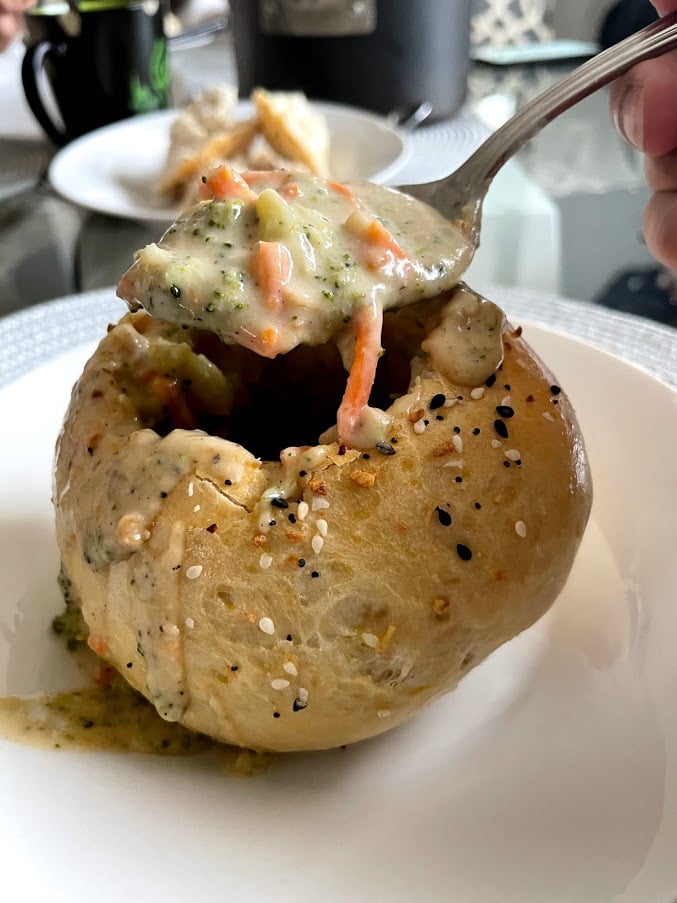 Rich and creamy broccoli cheese soup with fresh broccoli and carrots