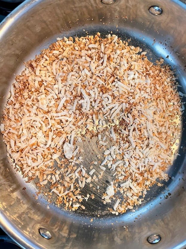 Dry roast the coconut flakes