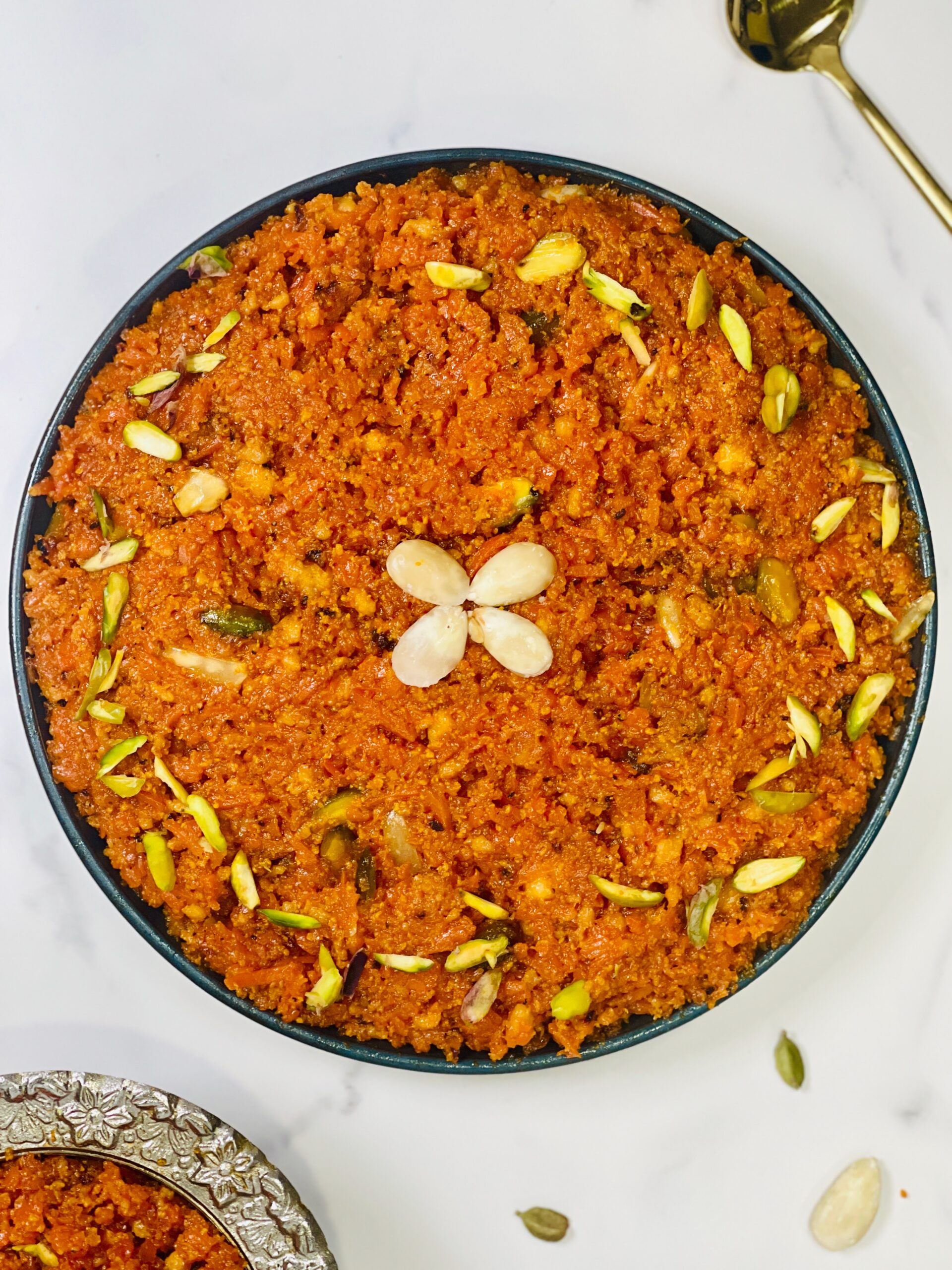 Gajar Ka Halwa carrot halwa topped with chopped nuts