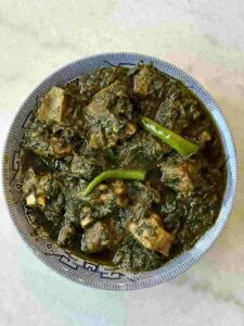 Palak Gosht serving in blue bowl