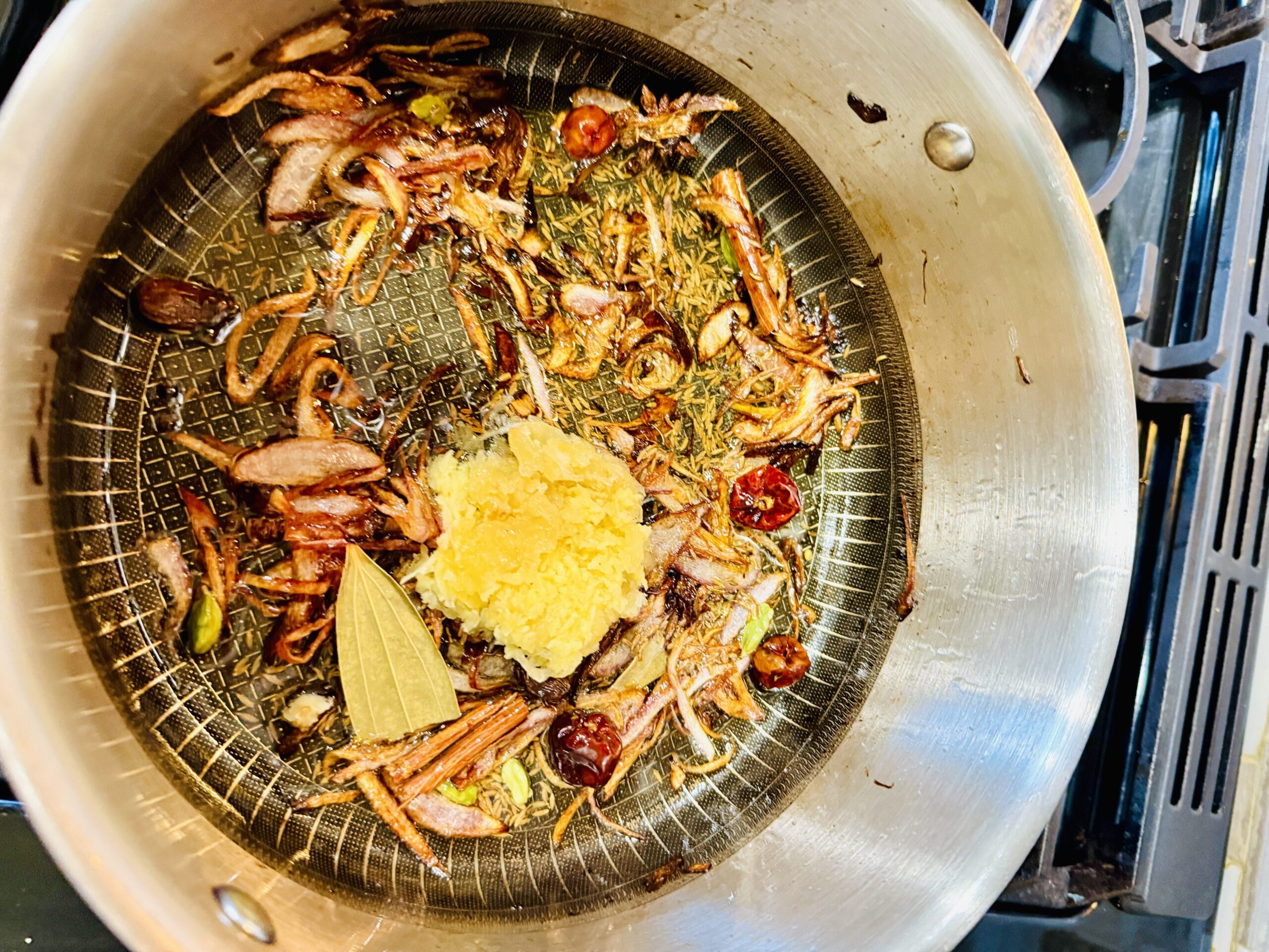 Add spices in Sauté onions