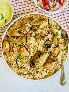 One-pot Pakistani Chicken Pulao with tender chicken, fluffy basmati rice, and aromatic spices served in a bowl