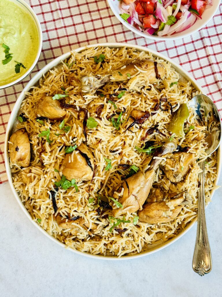 One-pot Pakistani Chicken Pulao with tender chicken, fluffy basmati rice, and aromatic spices served in a bowl